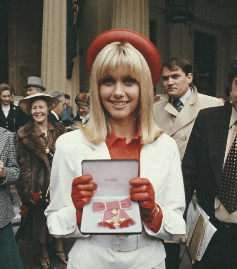 Olivia Newton John Dame olivia newton john receiving Dame Commander of the British Empire 2020